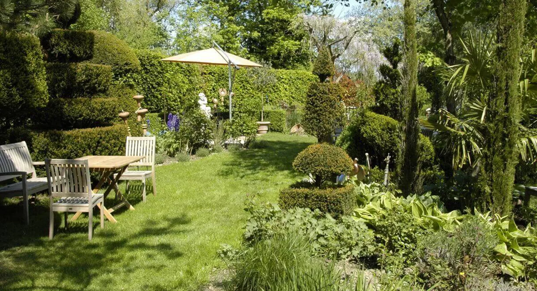 Pflege von Formgehölzen im Garten